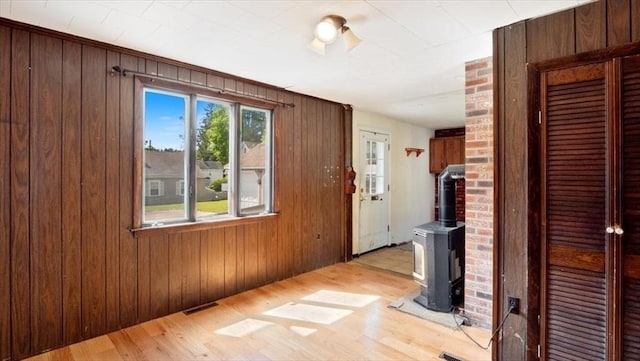 14 Maple St, Amesbury, MA 01913 - corridor with light wood-type flooring and wood walls