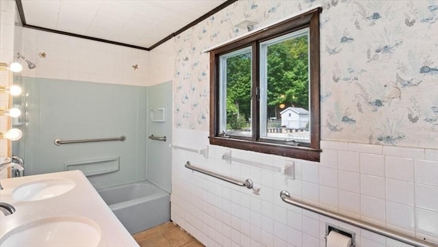 14 Maple St, Amesbury, MA 01913 - bathroom with wallpapered walls, crown molding, a wainscoted wall, washtub / shower combination, and double vanity