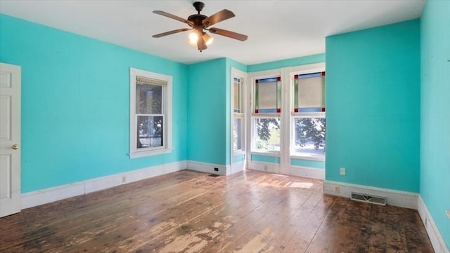 14 Maple St, Amesbury, MA 01913 - unfurnished room with hardwood / wood-style flooring, baseboards, and ceiling fan