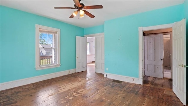 14 Maple St, Amesbury, MA 01913 - unfurnished bedroom with hardwood / wood-style floors, baseboards, and a ceiling fan