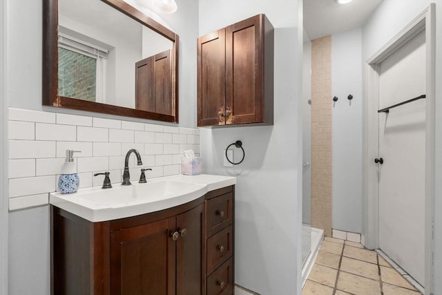 159 Cottage St Unit 6, Boston, MA 02128 - bathroom featuring a shower stall, vanity, and backsplash