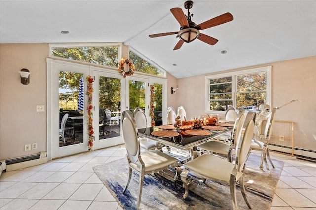 tiled dining area with a wealth of natural light, french doors, vaulted ceiling, and ceiling fan