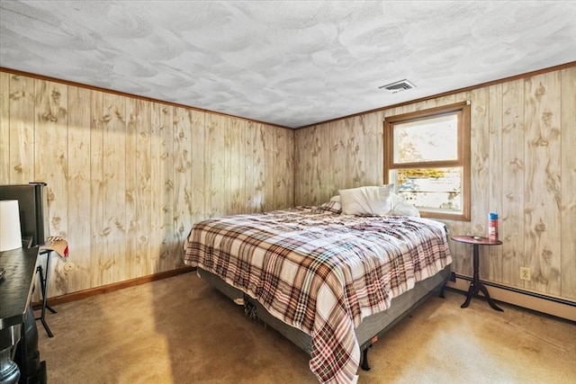 carpeted bedroom with wood walls