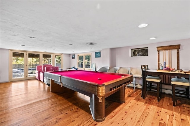 playroom featuring pool table, light hardwood / wood-style flooring, and french doors