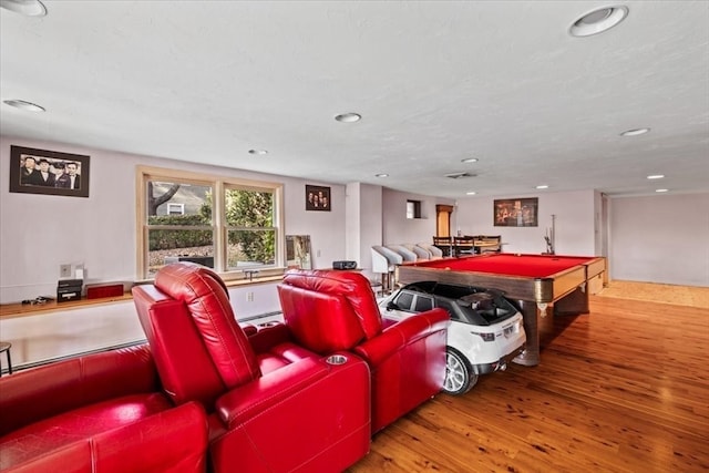 rec room with hardwood / wood-style flooring and billiards