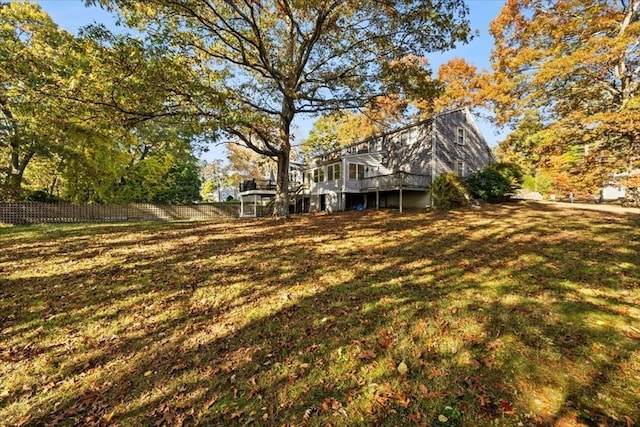 view of yard featuring a wooden deck