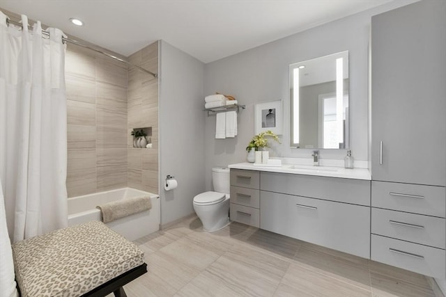 bathroom with toilet, shower / bath combo with shower curtain, vanity, and recessed lighting