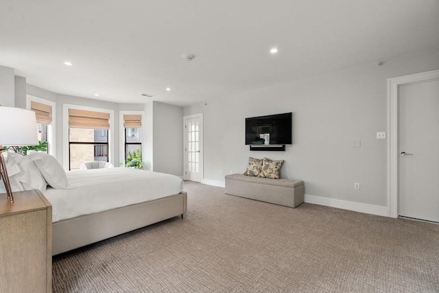 bedroom featuring recessed lighting, carpet flooring, and baseboards