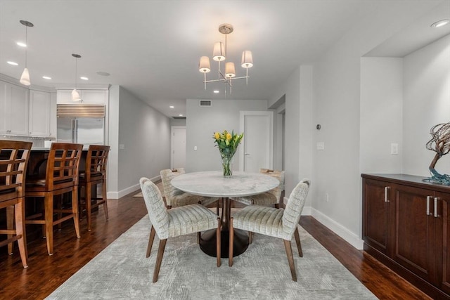 dining room with recessed lighting, dark wood finished floors, visible vents, and baseboards