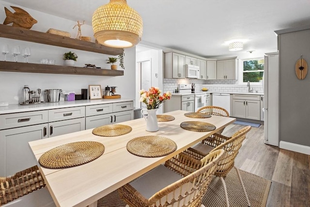 dining room with light wood-style floors