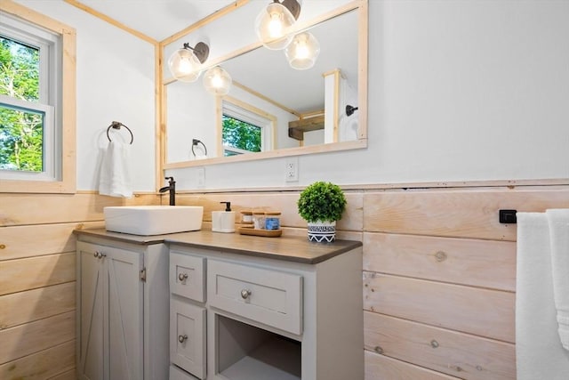 bathroom featuring a wealth of natural light and vanity