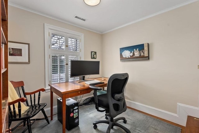 office space featuring visible vents, crown molding, and baseboards