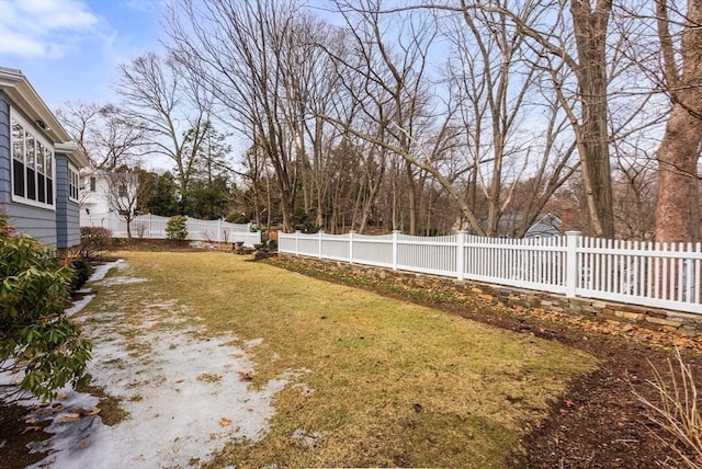 view of yard with a fenced backyard