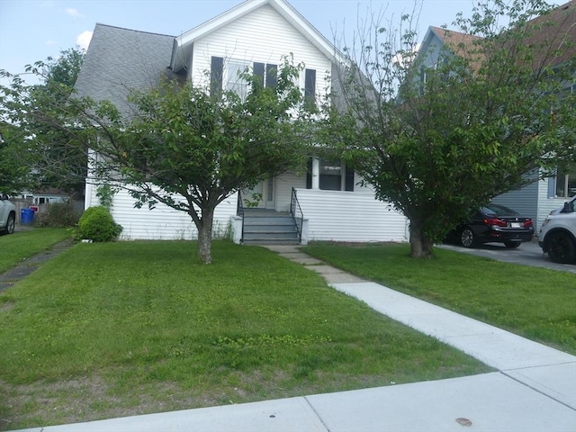 323 Burncoat, Worcester, MA 01606 - view of front of property with a front lawn and roof with shingles