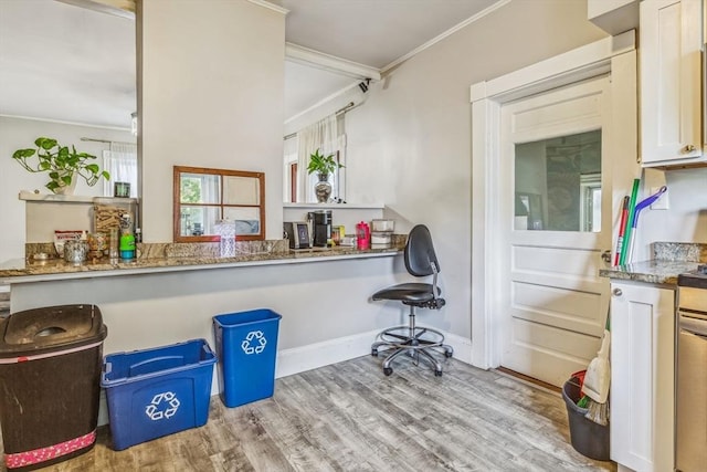 114 Chancery St, New Bedford, MA 02740 - kitchen featuring crown molding, an office area, wood finished floors, and baseboards