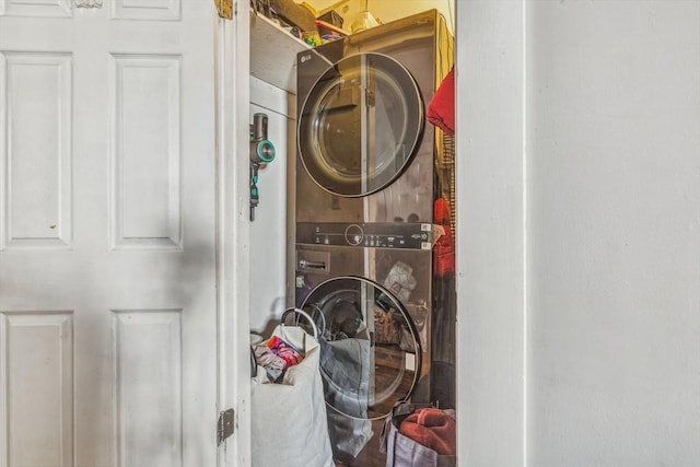 114 Chancery St, New Bedford, MA 02740 - clothes washing area featuring estacked washer and dryer