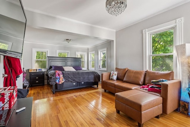 114 Chancery St, New Bedford, MA 02740 - bedroom featuring hardwood / wood-style flooring, crown molding, and a chandelier