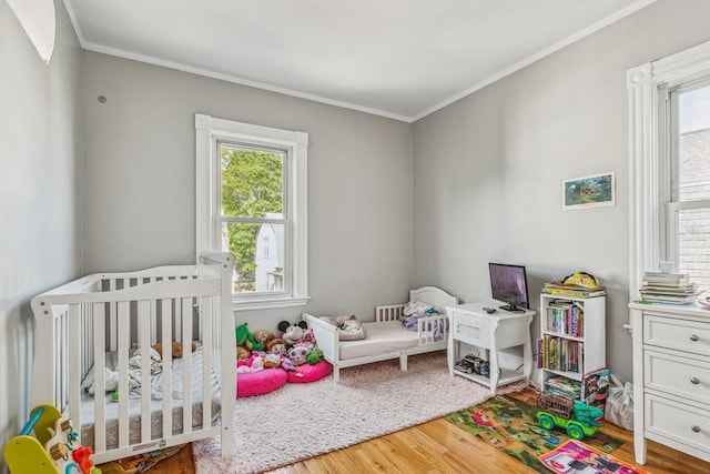 114 Chancery St, New Bedford, MA 02740 - bedroom with wood finished floors and crown molding