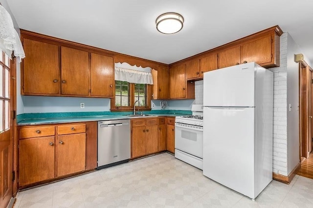 70 Fox Meadow Ln, Dedham, MA 02026 - kitchen featuring white appliances, brown cabinetry, light flooring, and light countertops