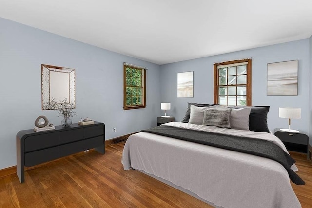 70 Fox Meadow Ln, Dedham, MA 02026 - bedroom featuring wood finished floors and baseboards