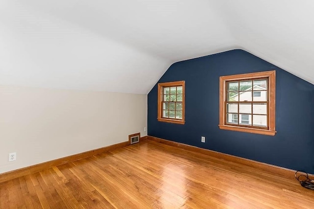 70 Fox Meadow Ln, Dedham, MA 02026 - additional living space featuring light wood finished floors and lofted ceiling