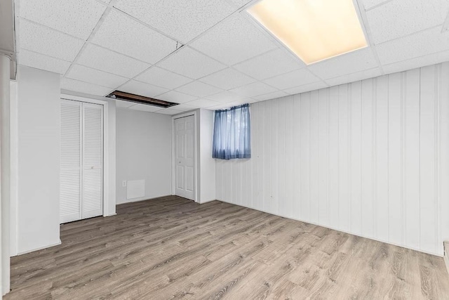 70 Fox Meadow Ln, Dedham, MA 02026 - finished basement featuring a drop ceiling and wood finished floors