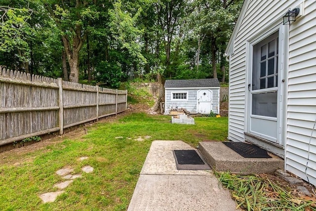 70 Fox Meadow Ln, Dedham, MA 02026 - view of yard with a storage unit and view of wooded area