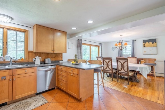143 Davis St, Northborough, MA 01532 - kitchen with dishwasher, a sink, a peninsula, light tile patterned floors, and recessed lighting