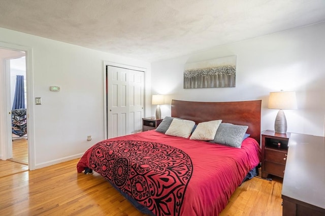 143 Davis St, Northborough, MA 01532 - bedroom featuring wood finished floors, baseboards, and a closet
