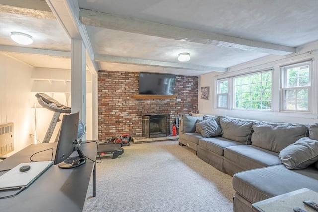 143 Davis St, Northborough, MA 01532 - living area with carpet, beamed ceiling, and a brick fireplace