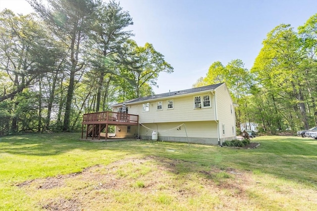 143 Davis St, Northborough, MA 01532 - back of property with a deck, a lawn, and stairway