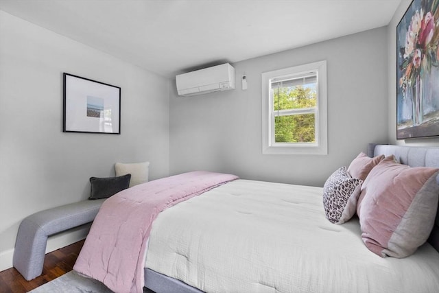 213 Thurston St, Wrentham, MA 02093 - bedroom featuring a wall mounted AC, wood finished floors, and baseboards