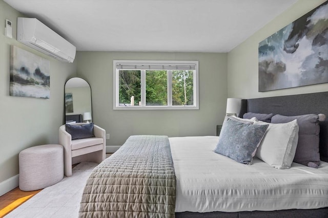 213 Thurston St, Wrentham, MA 02093 - bedroom featuring a wall unit AC, wood finished floors, and baseboards