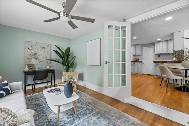 213 Thurston St, Wrentham, MA 02093 - living room featuring recessed lighting, a ceiling fan, light wood finished floors, and baseboards