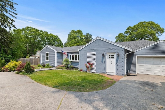 213 Thurston St, Wrentham, MA 02093 - single story home with an attached garage, driveway, and a shingled roof