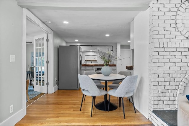 213 Thurston St, Wrentham, MA 02093 - dining room featuring light wood finished floors, recessed lighting, and baseboards