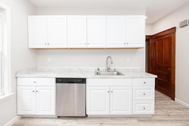 kitchen with dishwasher, light wood-type flooring, white cabinetry, and sink