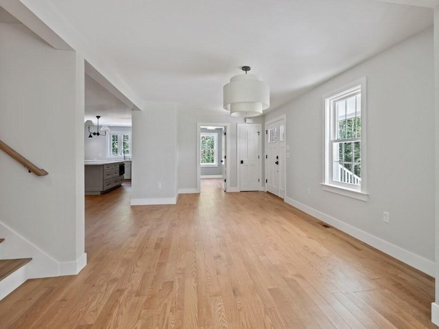 128 Old Southbridge Rd, Dudley, MA 01571 - entrance foyer featuring stairs and light wood-type flooring