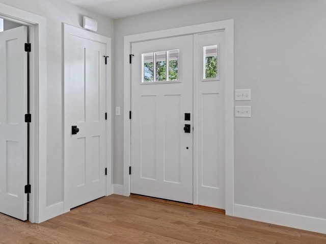128 Old Southbridge Rd, Dudley, MA 01571 - entryway featuring baseboards and light wood finished floors