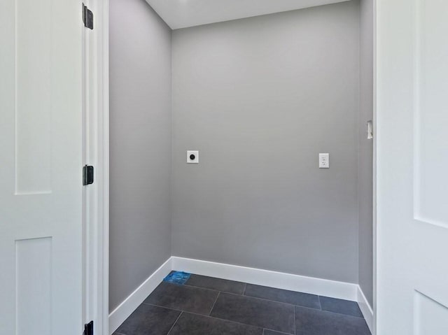 128 Old Southbridge Rd, Dudley, MA 01571 - washroom featuring electric dryer hookup and dark tile patterned floors