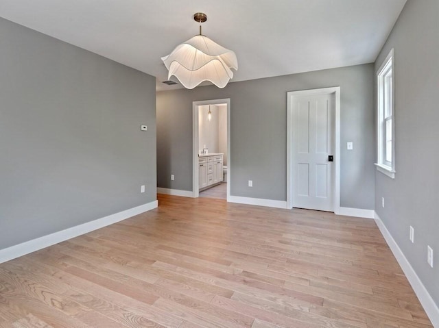 128 Old Southbridge Rd, Dudley, MA 01571 - empty room with light wood-type flooring and baseboards