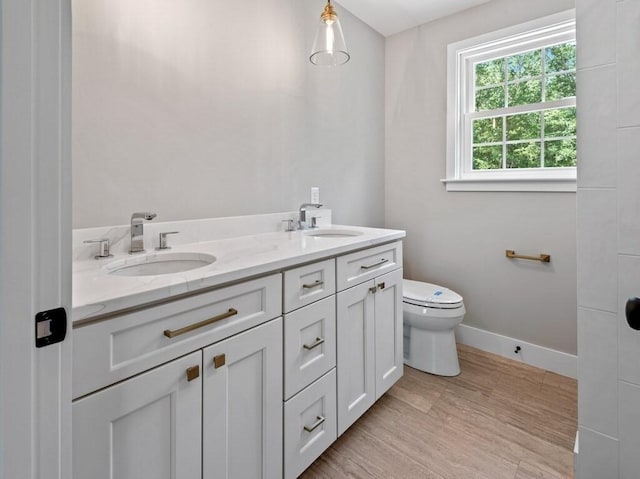128 Old Southbridge Rd, Dudley, MA 01571 - bathroom with double vanity and wood finished floors