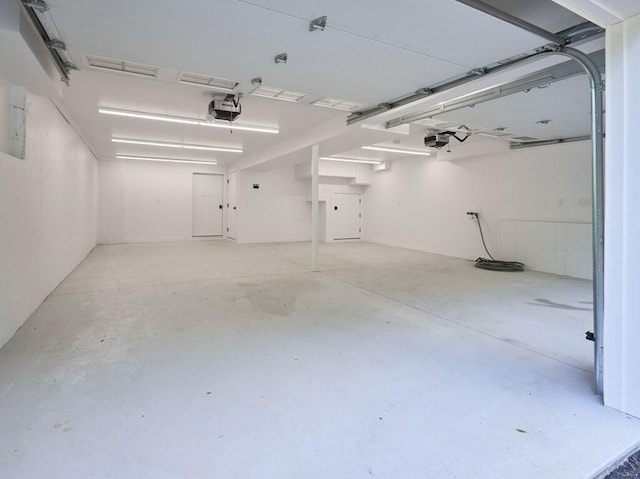 128 Old Southbridge Rd, Dudley, MA 01571 - garage featuring a garage door opener