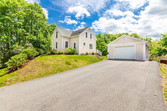 38 Davis St, Plymouth, MA 02360 - traditional-style house featuring a detached garage, an outdoor structure, a front lawn, and driveway