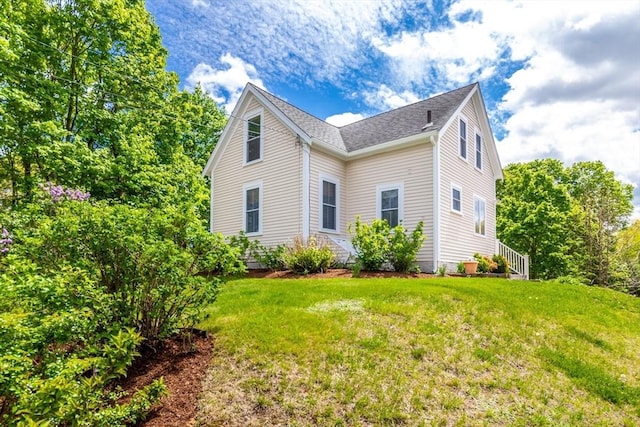 38 Davis St, Plymouth, MA 02360 - view of home's exterior with a yard