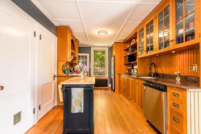 38 Davis St, Plymouth, MA 02360 - kitchen with stainless steel appliances, open shelves, light wood-style floors, and a sink