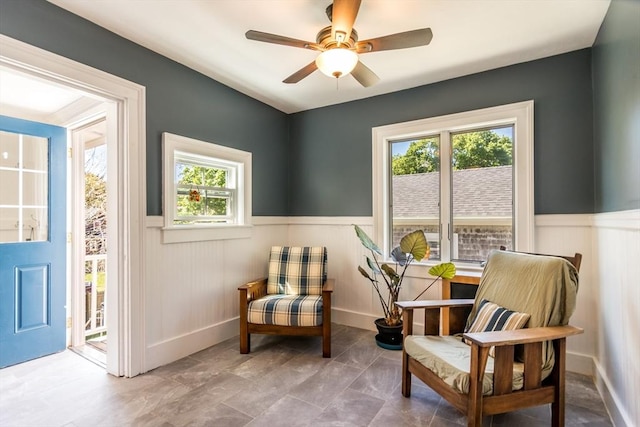 38 Davis St, Plymouth, MA 02360 - living area featuring wainscoting and a ceiling fan