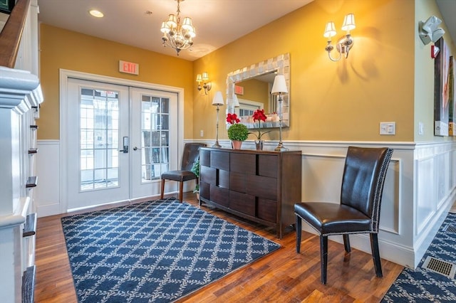21 Cielo Dr, Dover, NH 03820 - entrance foyer featuring french doors, a chandelier, wood finished floors, wainscoting, and recessed lighting