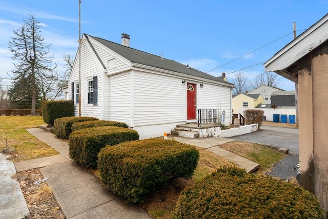 view of front of property with a chimney