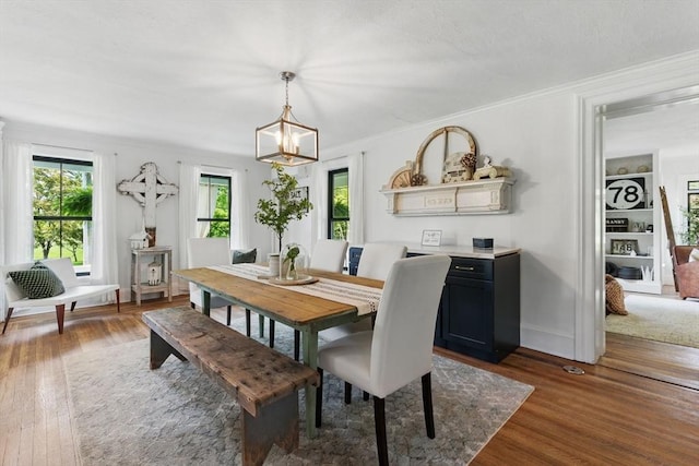 4 Porter St, Granby, MA 01033 - dining area with wood finished floors, a chandelier, and ornamental molding